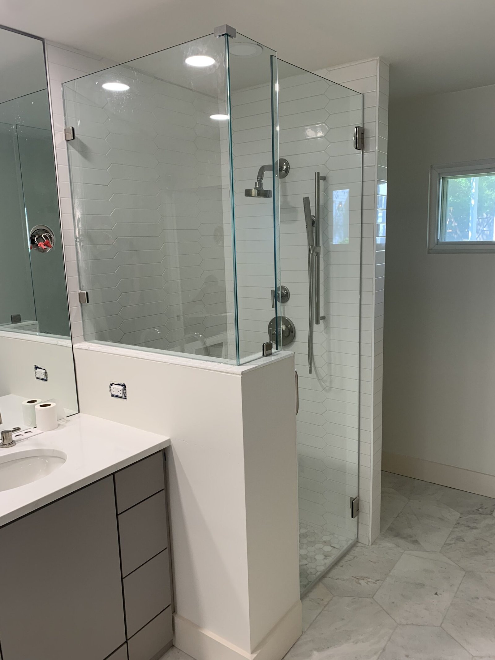 Freestanding soaking tub installed during a luxury bathroom remodel by Bath By Design SA in San Antonio, Texas.
